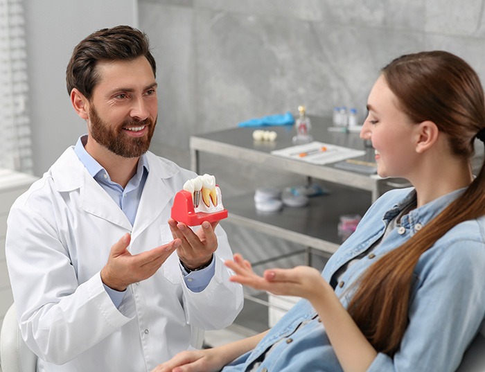 Dental Implant vs Bridge – Which Is Better? Expert Advice at Dr. Jain’s Dental